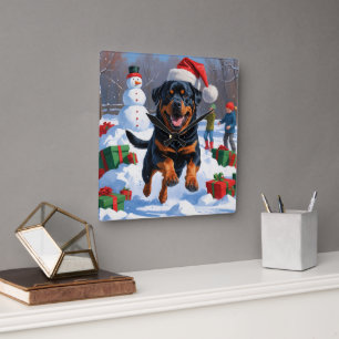 Rottweiler Running in Snow with Christmas Hat Square Wall Clock
