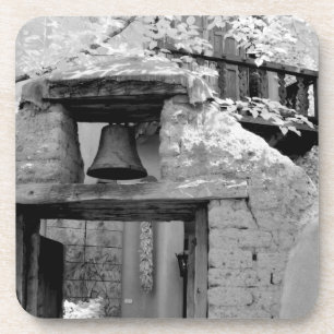 Rough adobe bell in entryway, Santa Fe, New Coaster