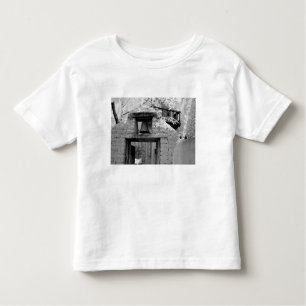 Rough adobe bell in entryway, Santa Fe, New Toddler T-Shirt
