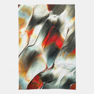 Rough silvery rock over burning ember, intensity tea towel