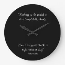Round Clock with Paulo Coelho Quote