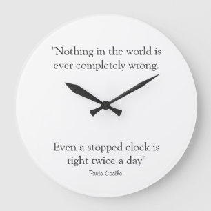 Round Clock with Paulo Coelho Quote