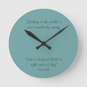 Round Clock with Paulo Coelho Quote
