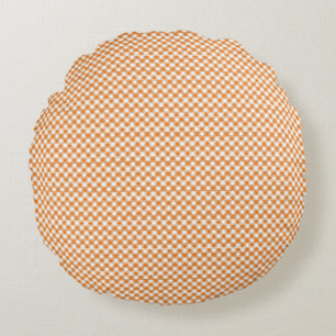 Round cushion with a brown and white gingham 