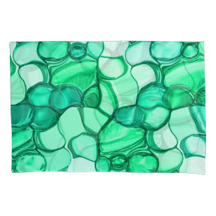 Round like stones in shades of clear green to mint pillowcase