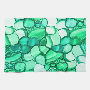 Round like stones in shades of clear green to mint tea towel