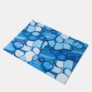 Round like stones in shades of royal blue doormat
