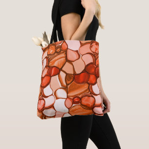 Round neven shapes like seeds, coral tones and red tote bag