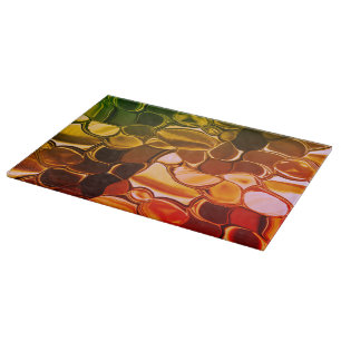 Round shapes that migrate from red to greenish cutting board