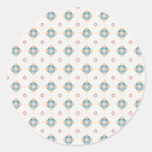 Round sticker with intricate blue and yellow 