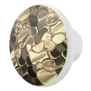 Rounded shapes in bronze colour, glossy light gold ceramic knob