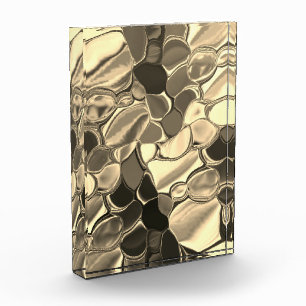 Rounded shapes in bronze colour, glossy light gold photo block