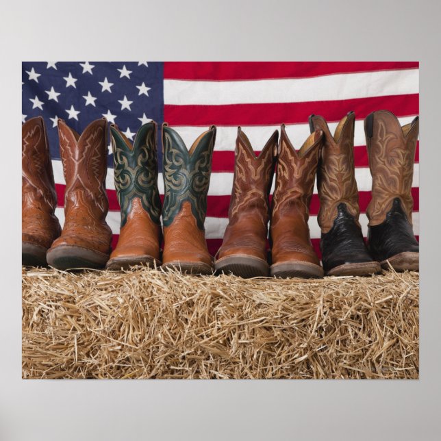 Row of cowboy boots on haystack poster (Front)
