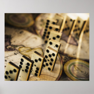 Row of dominoes on old world map 2 poster