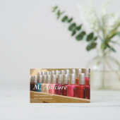 row of multi coloured nailpolishes business card (Standing Front)