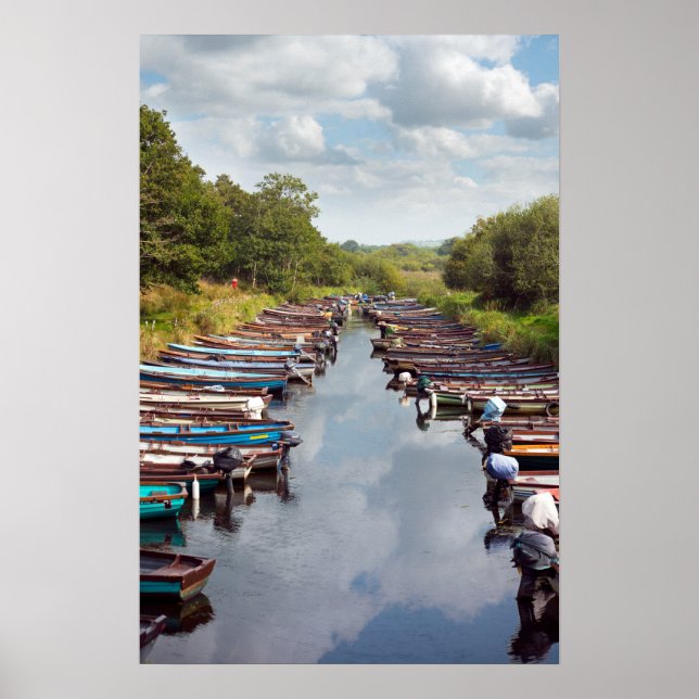 rowing boats moored at ross castle in killarney co poster (Front)