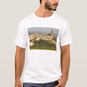 Rows of grape vines in the foreground frame the T-Shirt