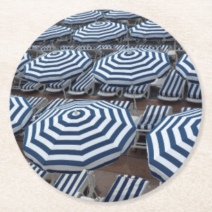 Rows Of Striped Beach Umbrellas With Sun Beds Round Paper Coaster