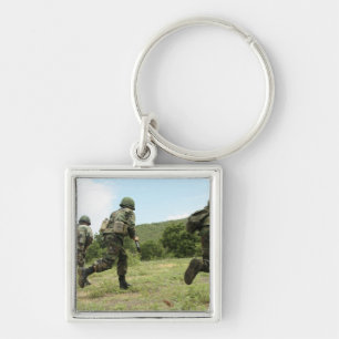 Royal Thai Marines rush forward to secure the s Key Ring