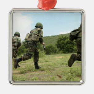 Royal Thai Marines rush forward to secure the s Metal Ornament