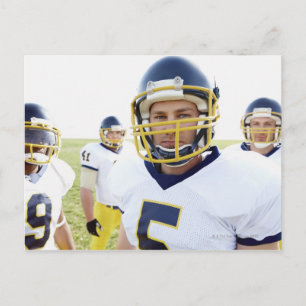 rugby player wearing helmet and standing postcard