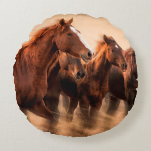 Running horses, blur and flying manes round cushion