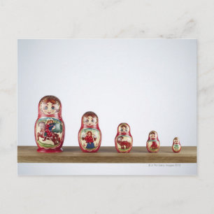 Russian dolls on a shelf. postcard