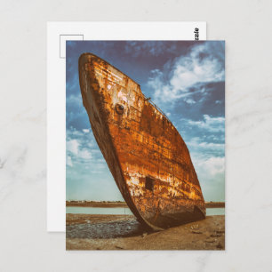 Rusted Shipwreck beached or stranded on a beach Postcard