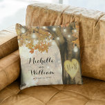 Rustic Autumn Tree Monogram Newlywed Couple Cushion<br><div class="desc">Autumn woodland newlywed pillow featuring a rustic fall tree covered in red, orange and yellow leaves, a carved heart with their initials, string twinkle lights and a modern text template. For further customisation, please click the "Personalise it" button to modify this template. All text style, colours, and sizes can be...</div>