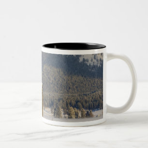Rustic barn and hay bales after a fresh snow 2 Two-Tone coffee mug