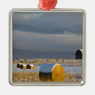 Rustic barn and hay bales after a fresh snow 3 metal ornament