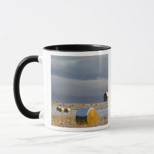 Rustic barn and hay bales after a fresh snow 3 mug