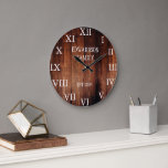 Rustic barn wood family name country large clock<br><div class="desc">Rustic,  dark barn wood wall clock with large Roman numbers.
You can personalise and add your own name and year established.</div>