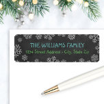 Rustic Black Chalkboard Snowflake Return Address Return Address Label<br><div class="desc">Dress up your envelopes in style this holiday season!  The label design features blue and green text (can be customised) on a rustic black chalkboard style background.  White sketched snowflakes surround custom text that can be personalised with your family / last name and return address.</div>