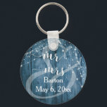 Rustic Blue Wood, White Light Strings Mr & Mrs Key Ring<br><div class="desc">This rustic, elegant wedding and event invitation suite of designs presents some popular wedding design trends combined in a fresh way. With a rich blue wood background and dual strings of twinkling light accents, I've combined one of the most beautiful modern script fonts from my collection to render graphic depicting...</div>