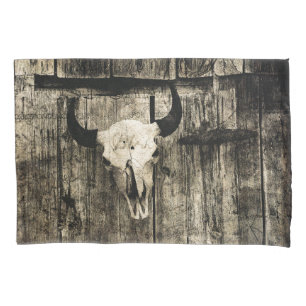 Rustic buffalo skull with horns on a barn pillowcase