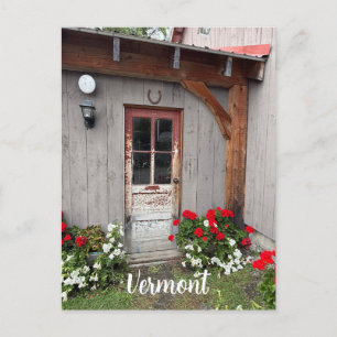 Rustic building with old door holiday postcard