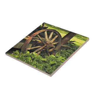 Rustic Charm – Weathered Wagon Wheel Photography Ceramic Tile