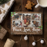 Rustic Country Merry Christmas 5 Photo Holiday Card<br><div class="desc">Country themed christmas holiday card featuring a rustic wood background,  a 5 collage photo template for you to personalise,  festive holly,  a snow shower,  the words "peace,  love,  hope" in a calligraphy typeface and your seasons greetings underneath.</div>