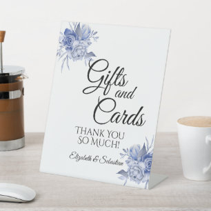 rustic dusty blue roses and other flowers pedestal sign
