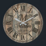 Rustic Family Monogram Wall Clock | Wood-Look<br><div class="desc">Celebrate your family's legacy with this stunning rustic monogram wall clock that brings timeless elegance to any home. 🕰️ Featuring a weathered wood-look background with vertical planks, a decorative ornate border, and Roman numerals framing a classic monogram design with a large initial, family name in flowing script, and established year,...</div>