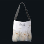 Rustic Field of Wildflowers Monogram Crossbody Bag<br><div class="desc">This beautiful bag features a rustic field of soft watercolor wildflowers.  Add a name to personalise it. Makes a great gift for the bride to be,  bridesmaid,  mum,  best friend,  or daugther! Created by Simply Farmhouse Press.</div>