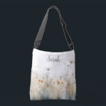 Rustic Field of Wildflowers Monogram Crossbody Bag<br><div class="desc">This beautiful bag features a rustic field of soft watercolor wildflowers.  Add a name to personalise it. Makes a great gift for the bride to be,  bridesmaid,  mum,  best friend,  or daugther! Created by Simply Farmhouse Press.</div>