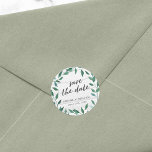 Rustic Greenery Save the Date Classic Round Sticker<br><div class="desc">This rustic Save the Date sticker featuring Italian Ruscus with the words "save the date" in trendy script all against a pale wood background. Personalise this by replacing the placeholder text in the template to add your information. For more options such as to change the font and it's size/colour or...</div>