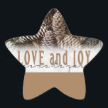 Rustic Holiday Love and Joy Pine Cone Star Sticker<br><div class="desc">Festive,  rustic pine cones accentuate this classic,  elegant design wishing holiday Love and Joy.</div>