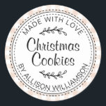 Rustic Homemade Christmas Cookies Pink Check Classic Round Sticker<br><div class="desc">Rustic, modern and simple homemade baked goods apple pie sticker with the text made with love, Christmas cookies and your name in elegant handwritten script calligraphy and typography on a pastel pink check pattern background with a stylish touch of foliage. Simply add your name and the product name to the...</div>