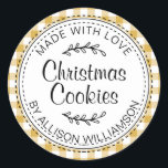Rustic Homemade Christmas Cookies Yellow Check Classic Round Sticker<br><div class="desc">Rustic, modern and simple homemade baked goods apple pie sticker with the text made with love, Christmas cookies and your name in elegant handwritten script calligraphy and typography on a yellow check pattern background with a stylish touch of foliage. Simply add your name and the product name to the label....</div>