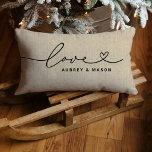 Rustic Linen Love Heart Script Couple Names Lumbar Cushion<br><div class="desc">A rustic lumbar pillow featuring Love in flowing black heart script with customisable couple names on a textured beige linen background. The earthy,  farmhouse-inspired design makes a charming wedding gift,  anniversary keepsake,  or cosy living room accent. All text is fully editable to personalise with any couple's names.</div>