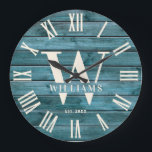 Rustic Monogram Driftwood Custom Family Name Large Clock<br><div class="desc">Personalised Family Name, monogram, and year established Rustic Modern Wall clock in a trendy farmhouse style design with roman numeral clock face and turquoise grey driftwood plank / shiplap backdrop design. Perfect gift for newlyweds, wedding or housewarming present or grandparents gift, or for a home make-over in your beach cabin,...</div>