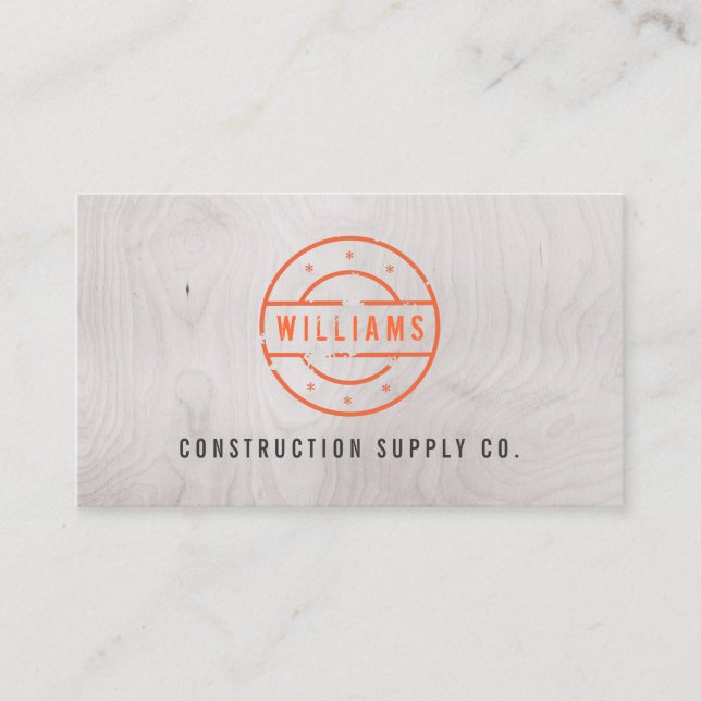 Rustic Orange Stamp on Grey Woodgrain Construction Business Card (Front)